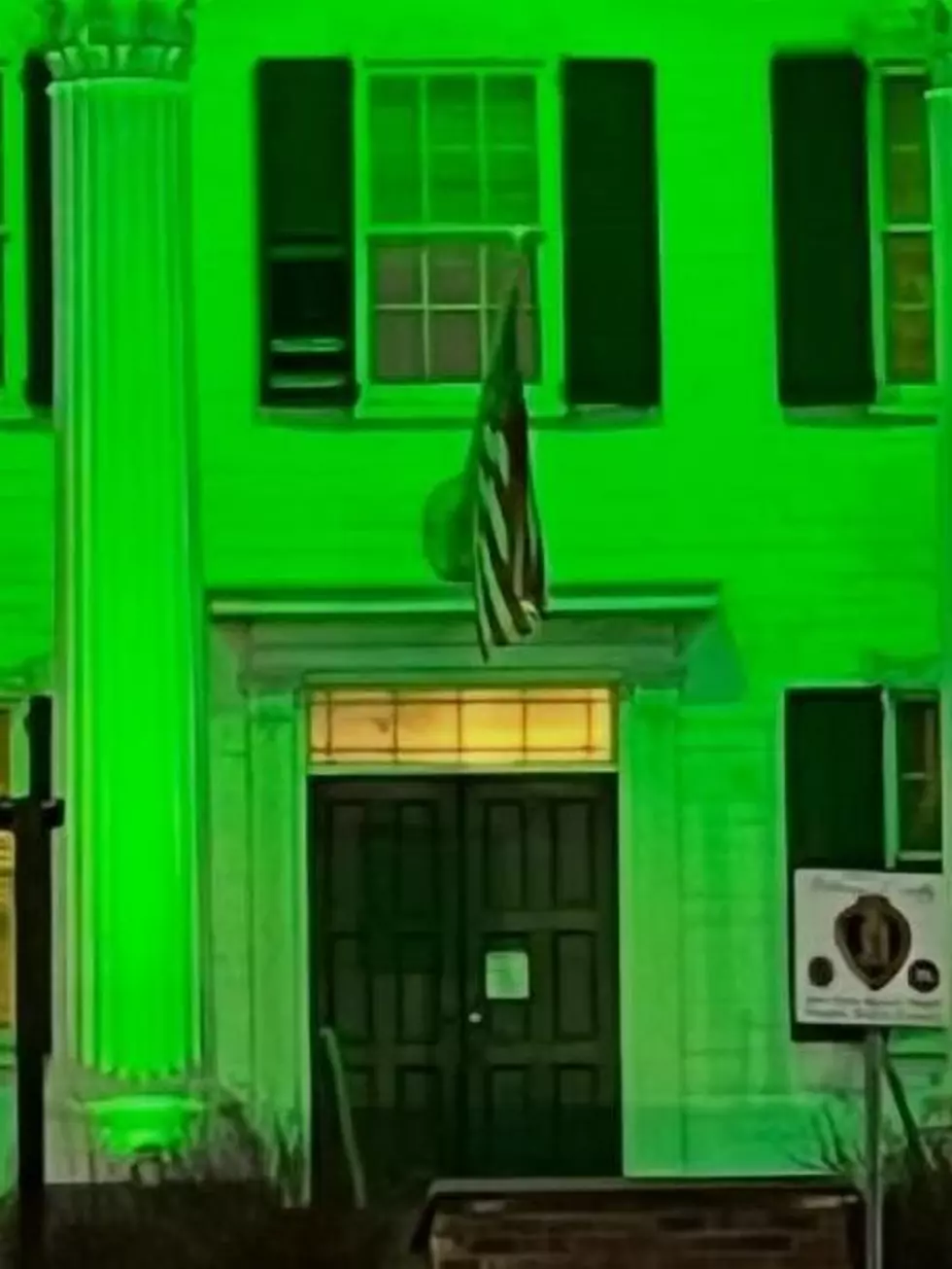 Why Are Local Landmarks Lighting Up Green?
